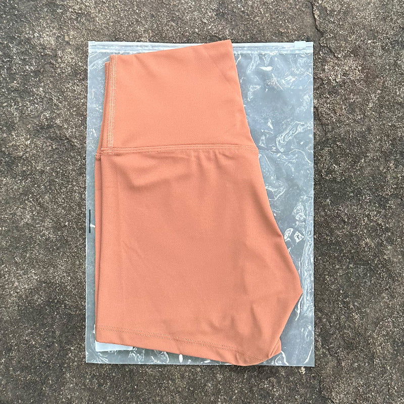 New Nude High-Waist Brushed Shorts Yoga Wear Nylon Shorts Women's Tight Yoga Three-Point Sports Shorts Peach