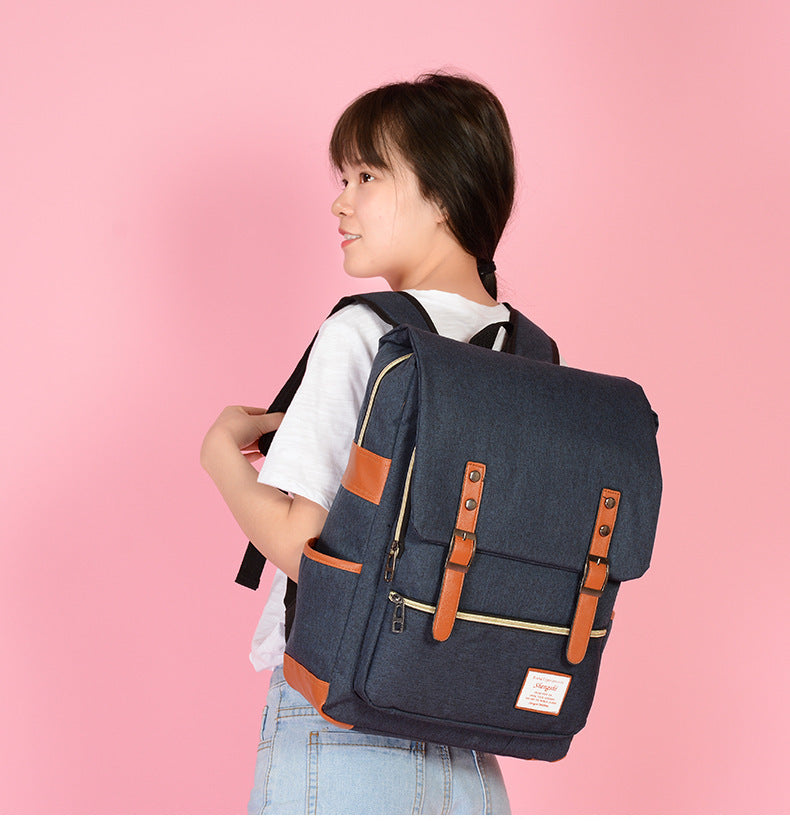 Foreign trade new schoolbag men's personality retro outdoor canvas travel backpack women's fashion backpack a generation of hair
